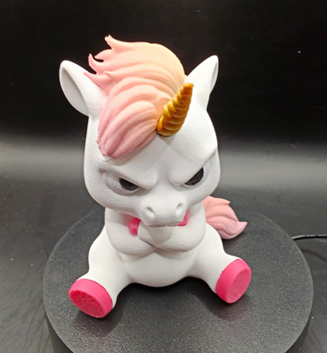 Einhorn figur sitzend bemalt - sitzend,